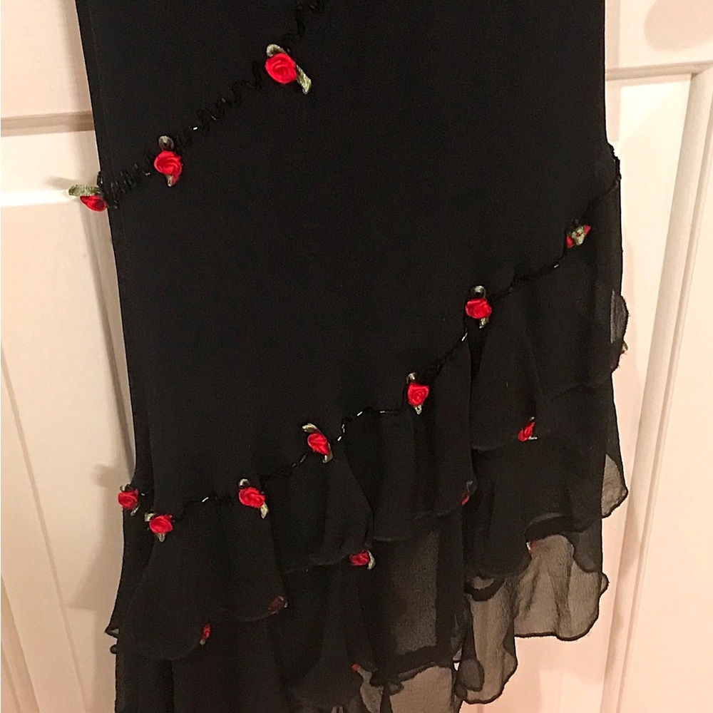 Dress Barn black asymmetrical dress with beading and red roses.